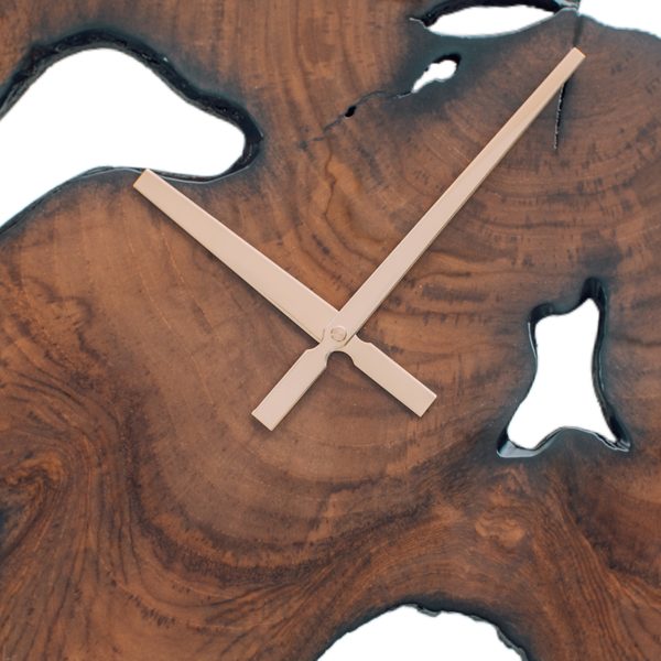 Teak clock cross-section with a natural void, a statement piece for a living room or office wall